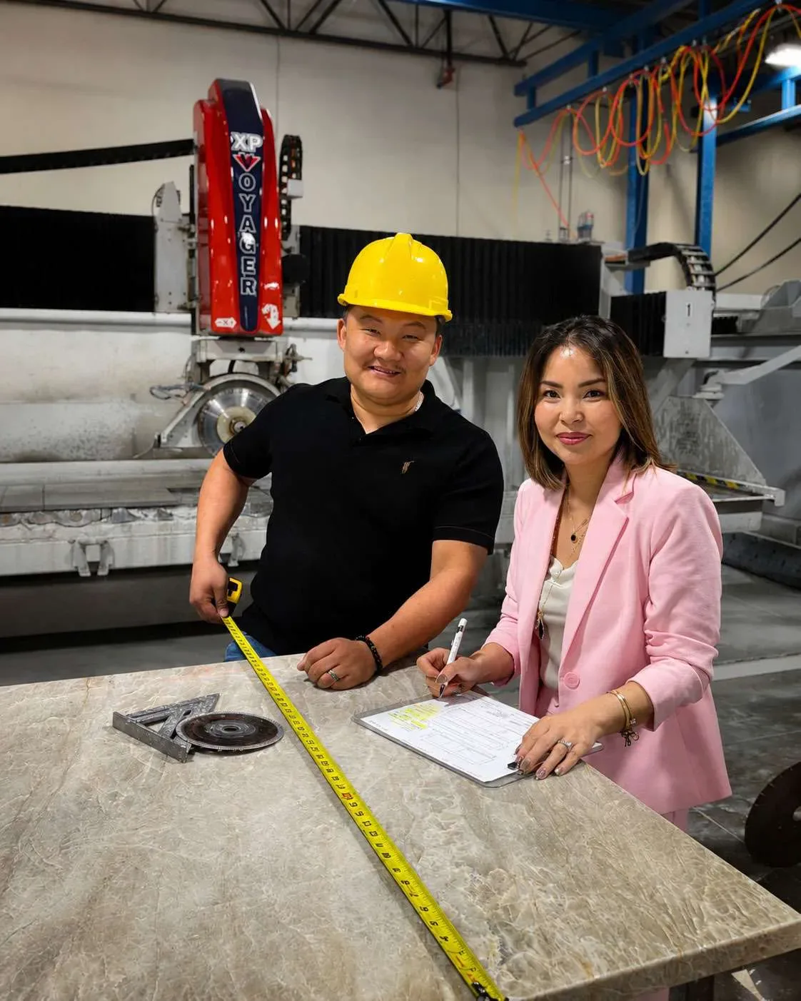 Bagi and Megan Tseren on the fabrication floor